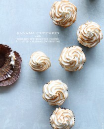 Banana Cupcakes with Bourbon Butterscotch Filling and Toasted Marshmallow Frosting from Bakers Royale 210x260