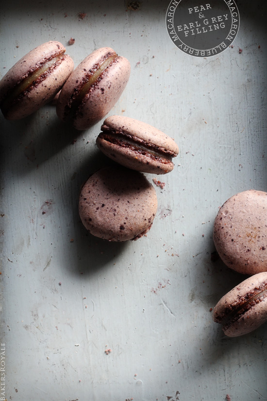 Blueberry Macarons with Pear & Earl Grey Filling on counter. 