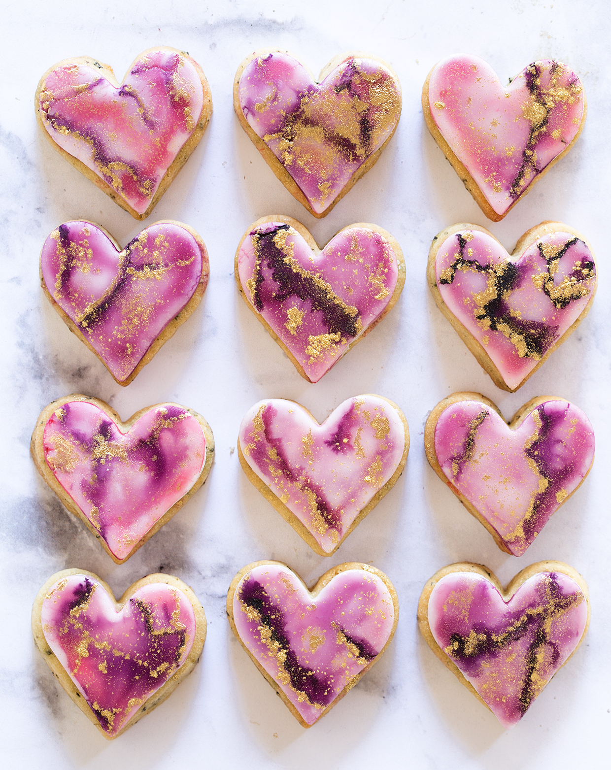 https://www.bakersroyale.com/wp-content/uploads/2018/02/Sugar-Cookies-with-Watercolor-Painted-Marshmallow-Fondant-via-Bakers-Royale.jpg